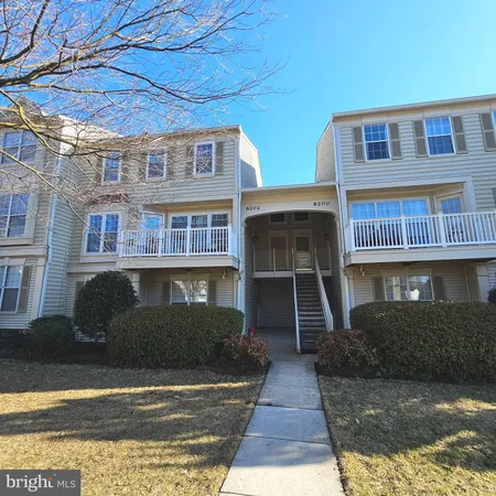 a front view of a house with garage