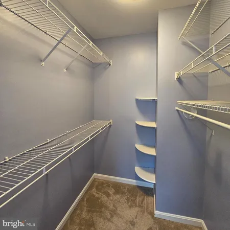 a view of a room with rack on the wall