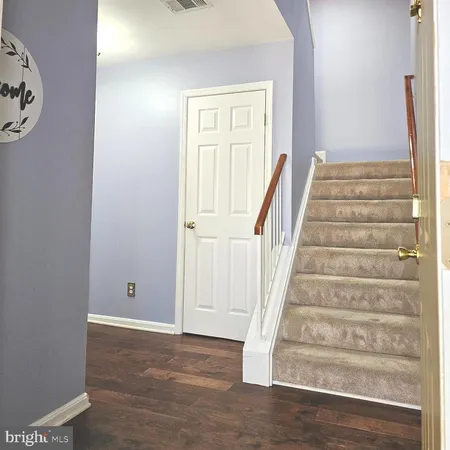 a view of an entryway with staircase