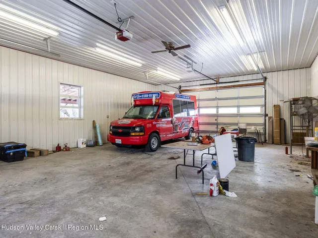 a view of a garage with furniture