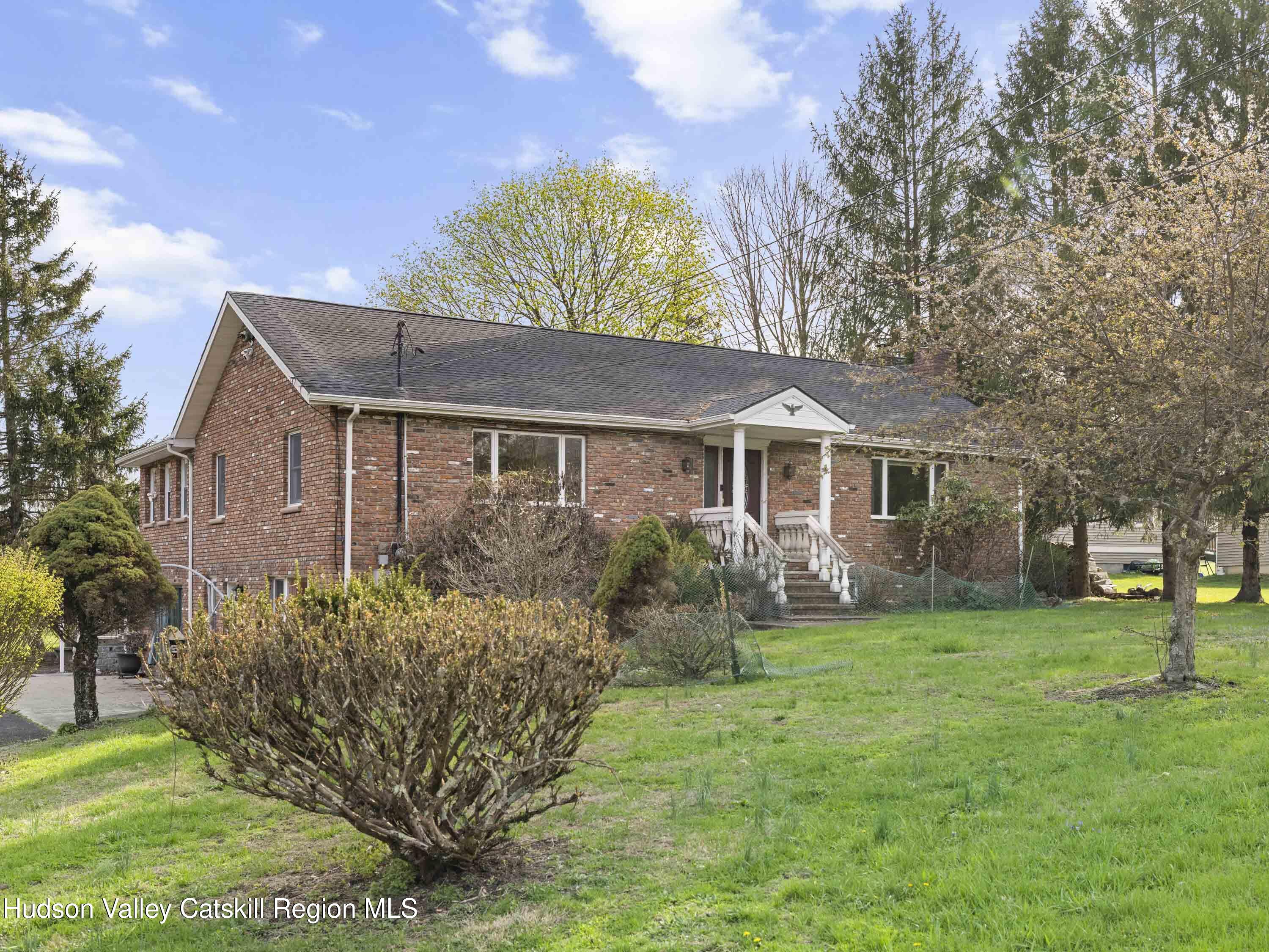 463 Mckinstry Road Gardiner, NY 12525 - Photo 51 of 52 a front view of a house with a garden