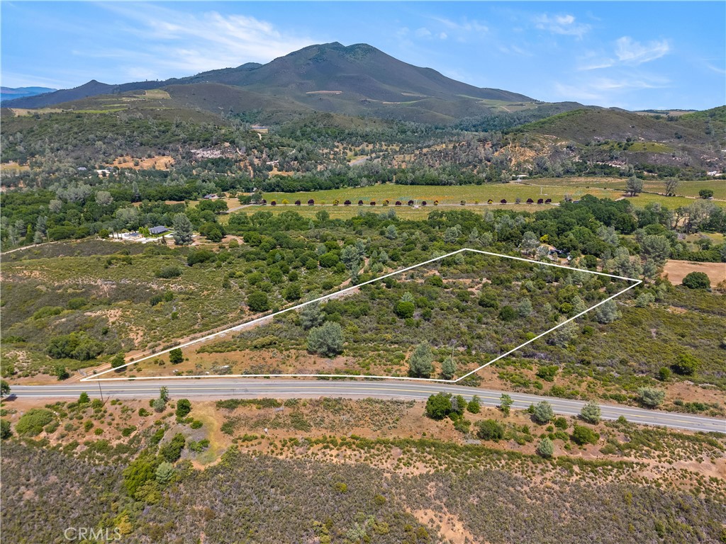 8152 Bottle Rock Road Kelseyville, CA 95451 - Photo 3 of 28 a view of a mountain with a forest