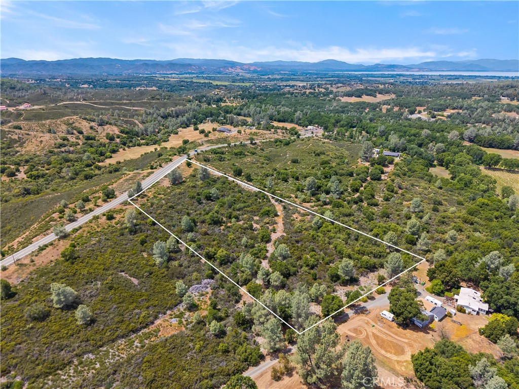 8152 Bottle Rock Road Kelseyville, CA 95451 - Photo 9 of 28 a view of a city with mountains in the background