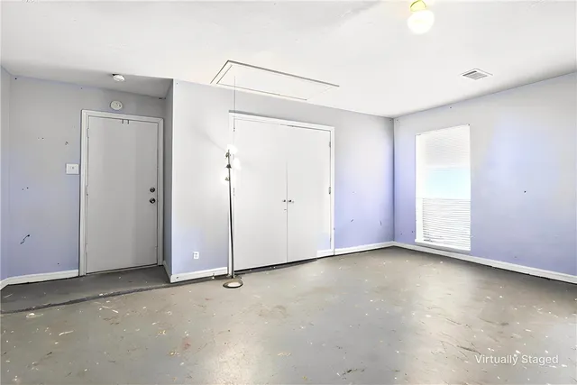 an empty room with window