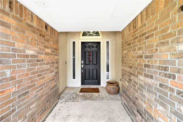 a view of a entryway door front of a building