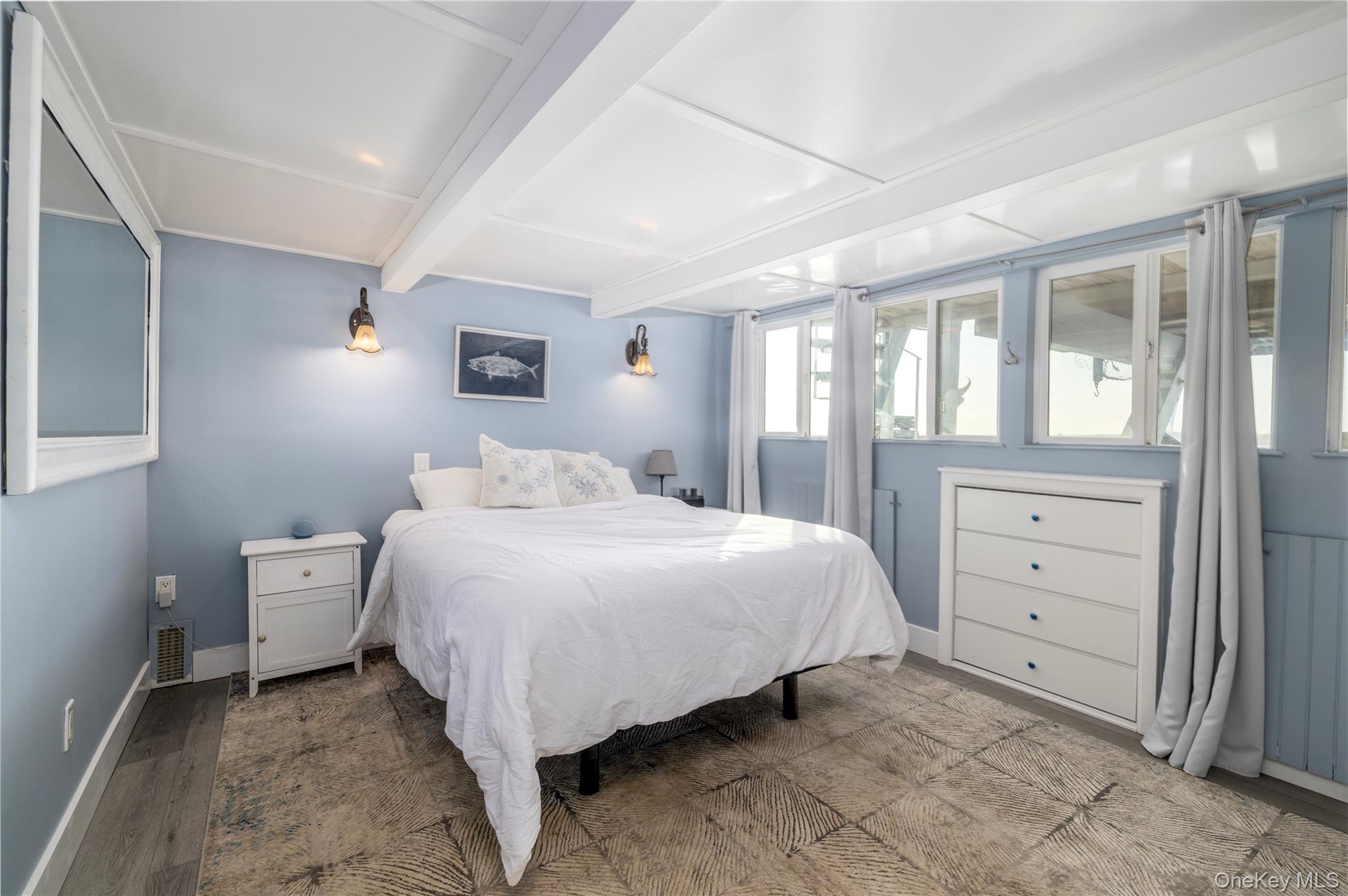 220 Shore Road Seaford, NY 11783 - Photo 13 of 23 a bedroom with a bed and a window