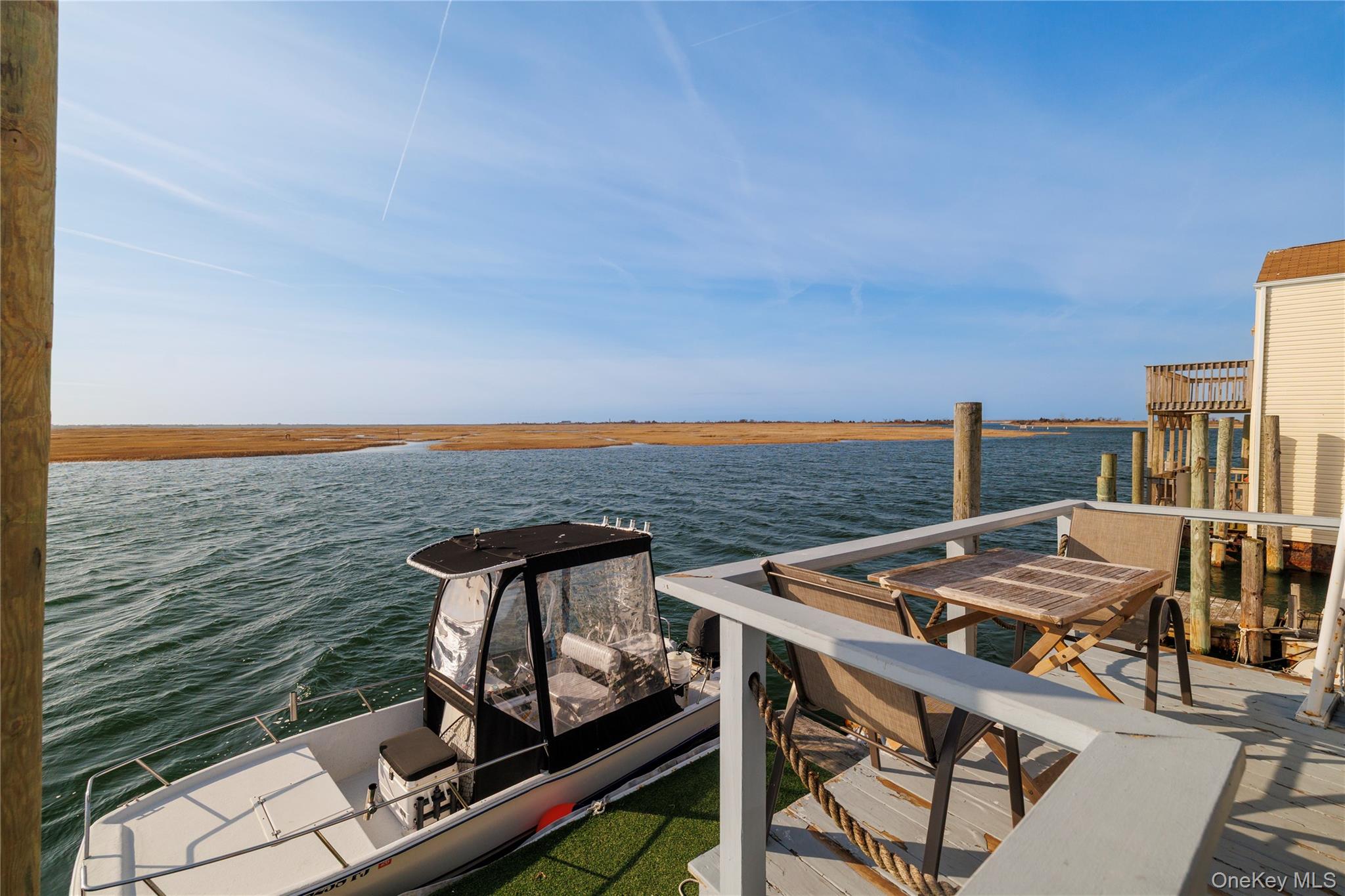 220 Shore Road Seaford, NY 11783 - Photo 20 of 23 a view of a terrace with two chairs