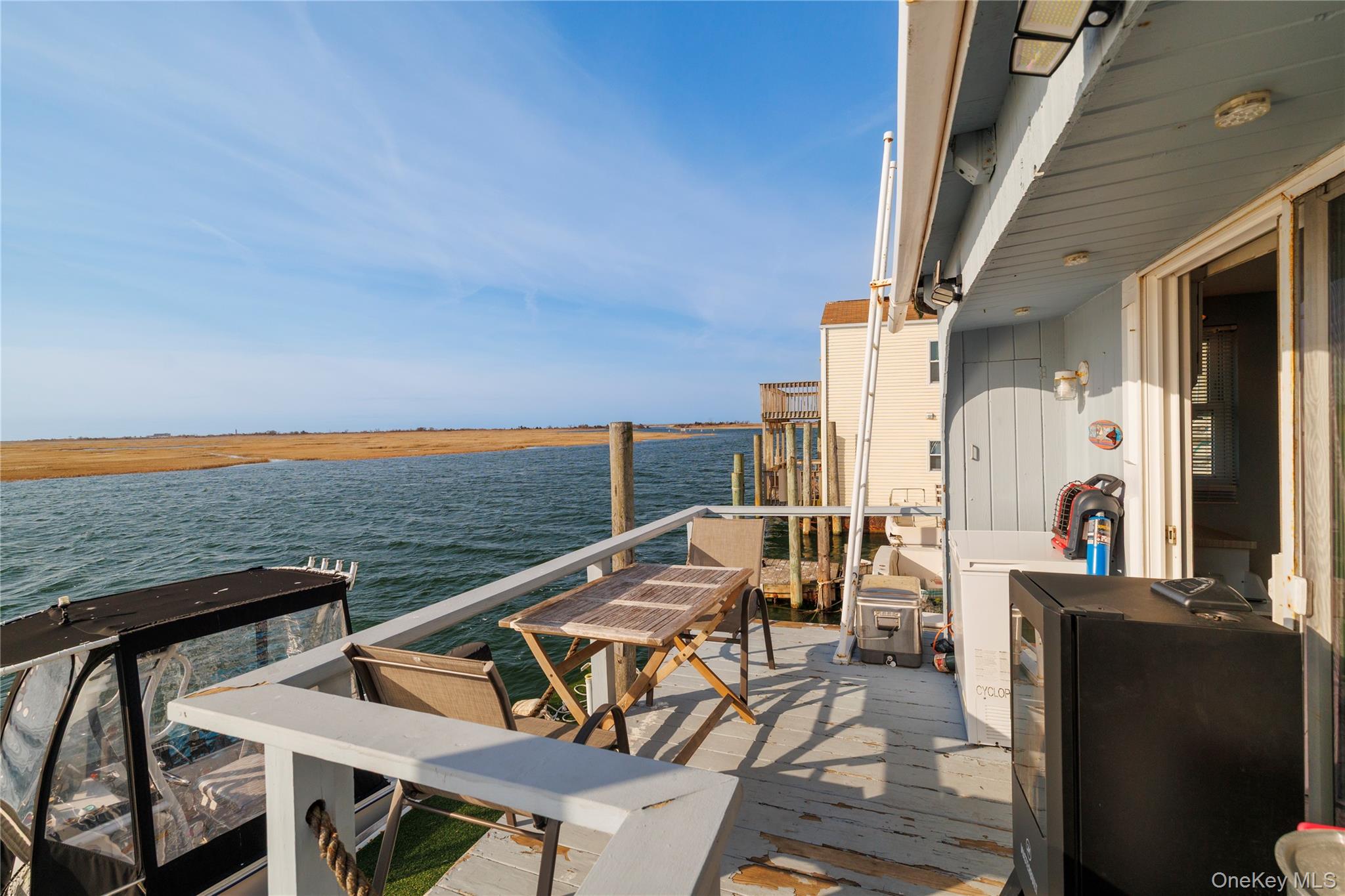 220 Shore Road Seaford, NY 11783 - Photo 21 of 23 a view of a balcony with furniture