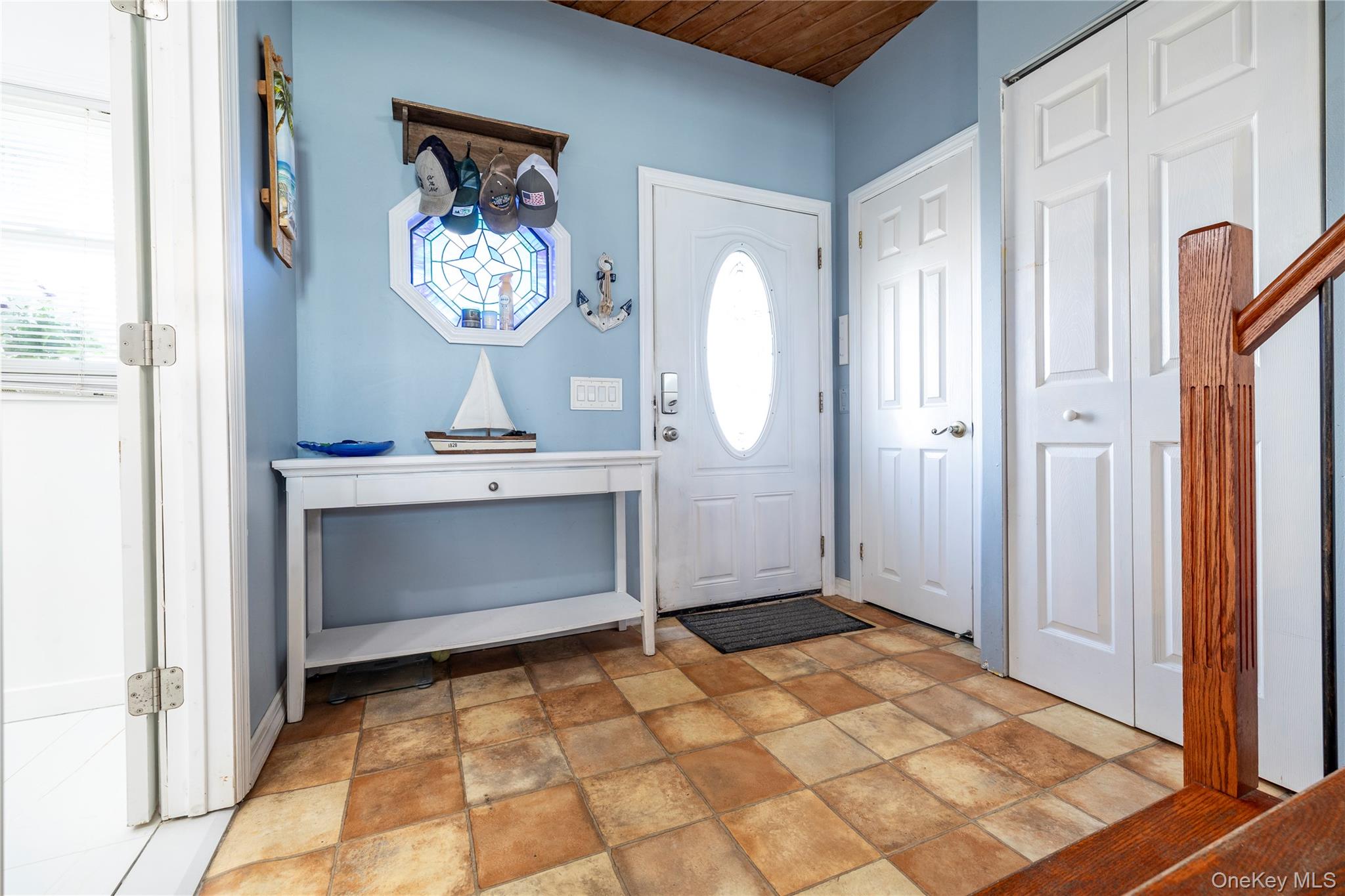 220 Shore Road Seaford, NY 11783 - Photo 4 of 23 a view of bathroom with a mirror and a shower