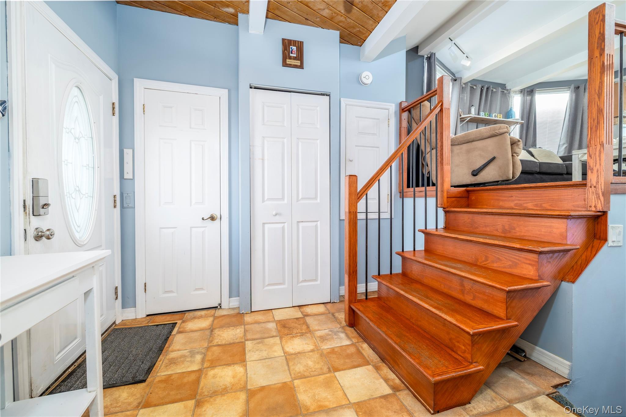 220 Shore Road Seaford, NY 11783 - Photo 5 of 23 a view of an entryway with staircase