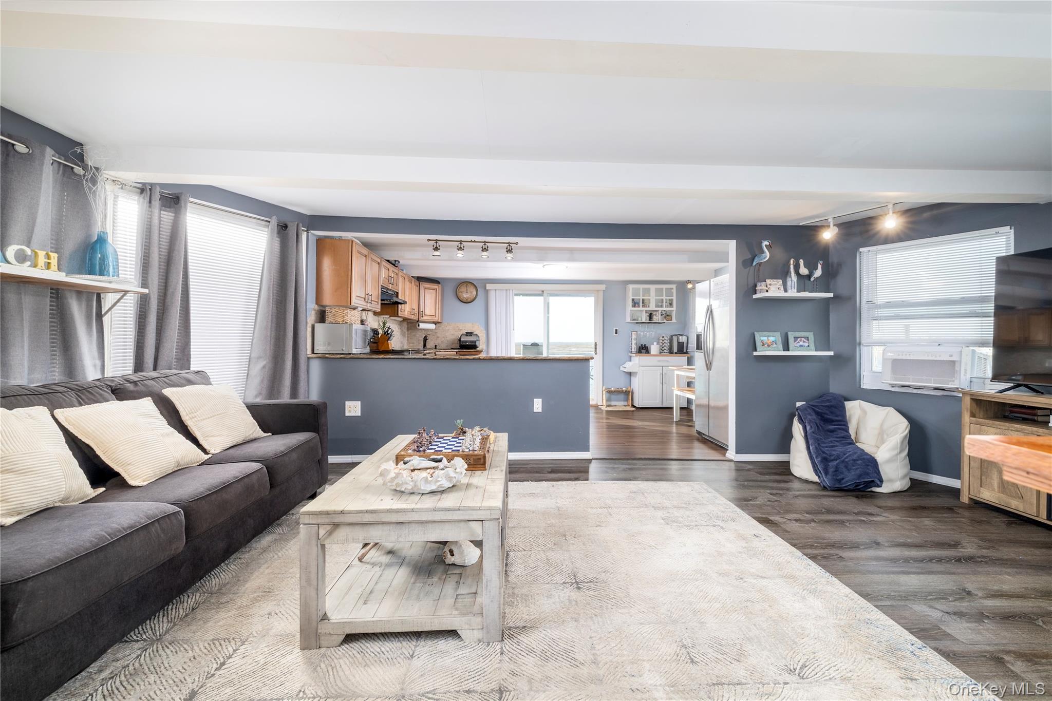 220 Shore Road Seaford, NY 11783 - Photo 8 of 23 a living room with furniture and a couch