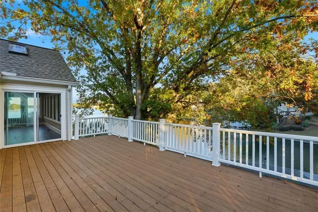a view of a kitchen with a sink and dishwasher cabinets