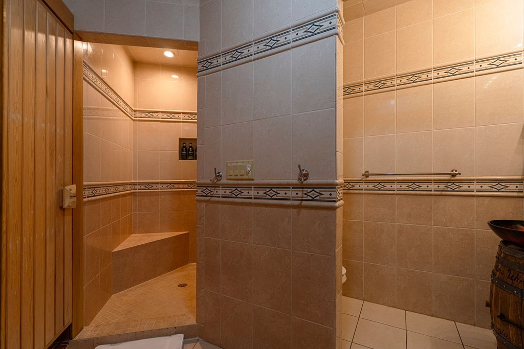 201 Mountainside Parkway Ellijay, GA 30536 - Photo 29 of 78 a bathroom with a shower and a shower