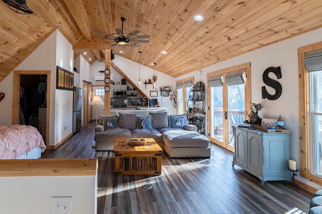 201 Mountainside Parkway Ellijay, GA 30536 - Photo 40 of 78 a living room with furniture and wooden floor
