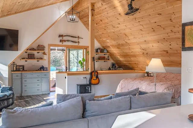 a view of a balcony with a table and chairs