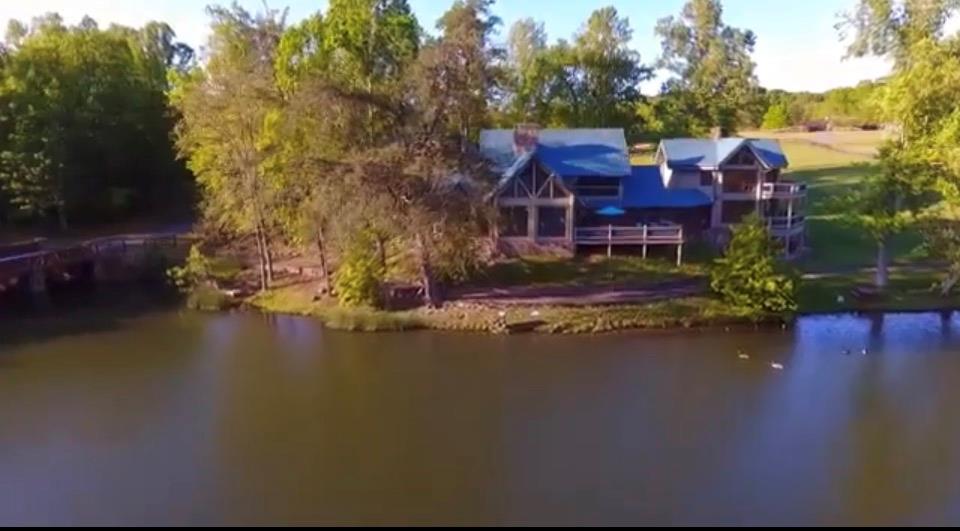 201 Mountainside Parkway Ellijay, GA 30536 - Photo 77 of 78 a view of a house with pool and lake view