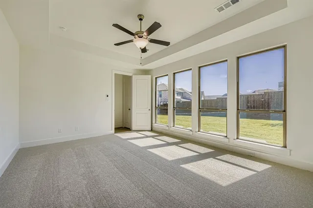 a bathroom with double sink and a mirror
