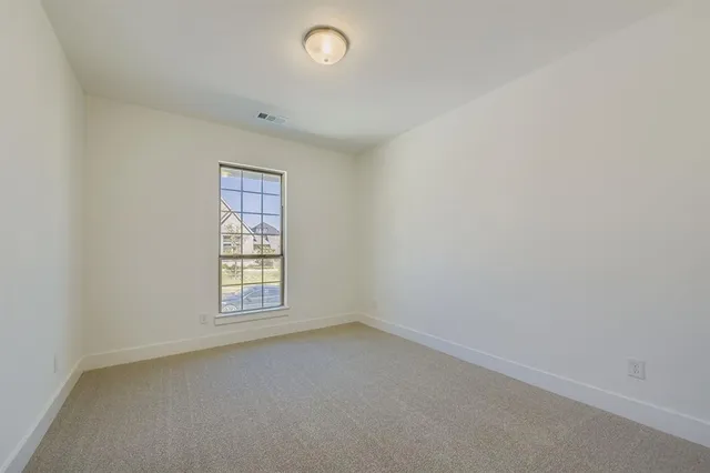 a bathroom with a shower a sink a toilet and shower