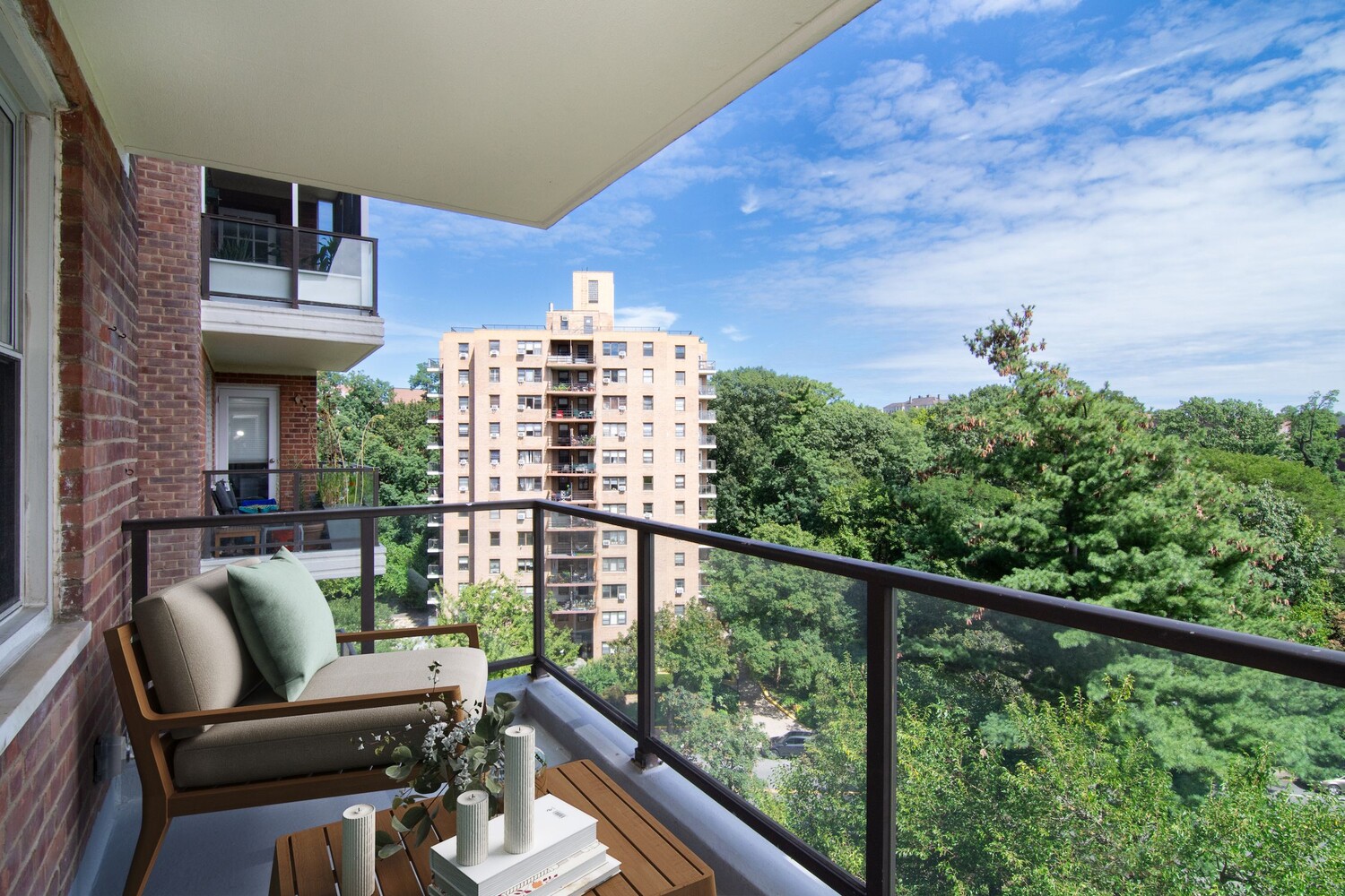 750 Kappock Street, Unit 807 Bronx, NY 10463 - Photo 20 of 28 a balcony with furniture and a potted plant