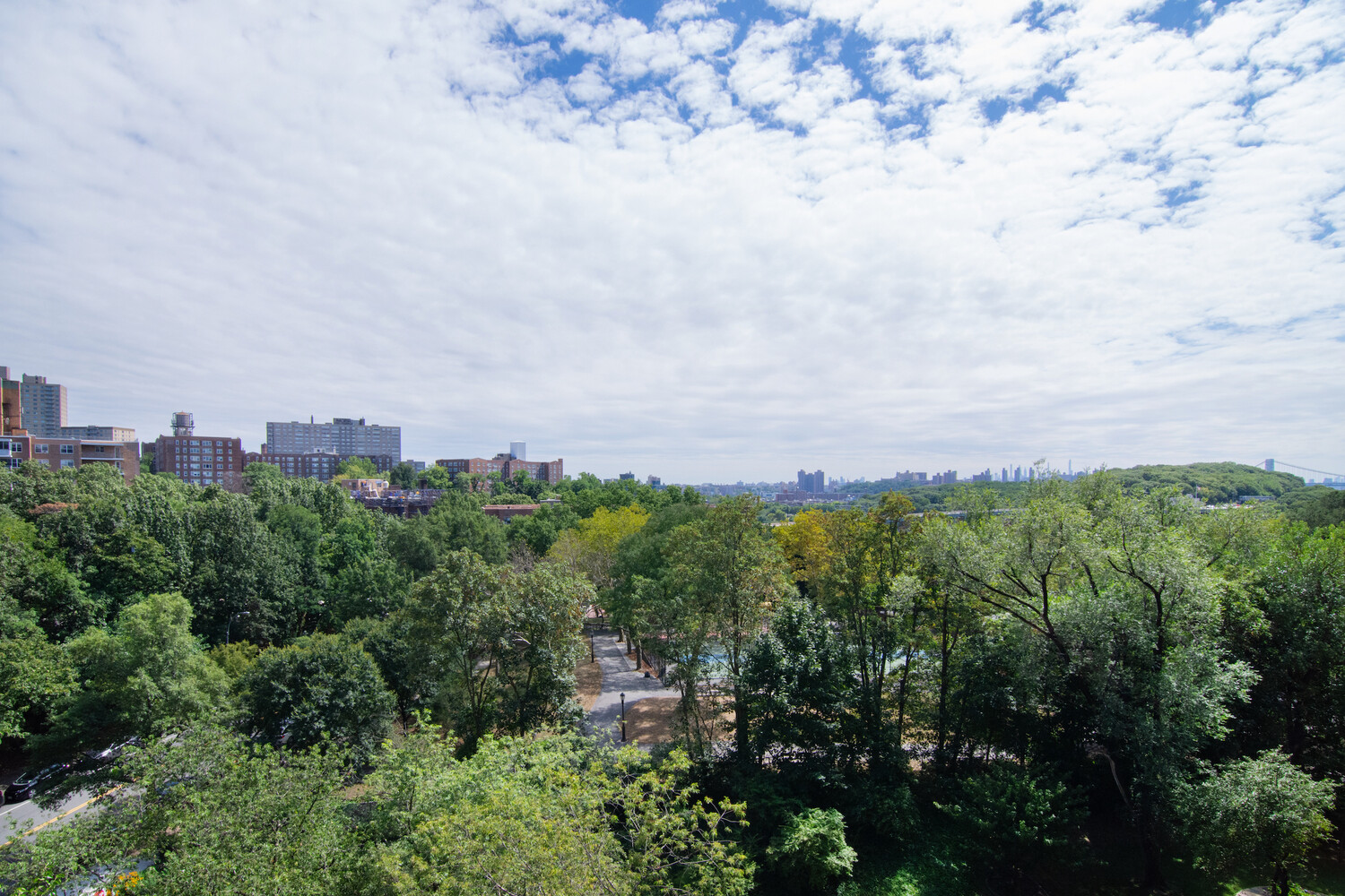 750 Kappock Street, Unit 807 Bronx, NY 10463 - Photo 23 of 28 a view of a city with lush green forest