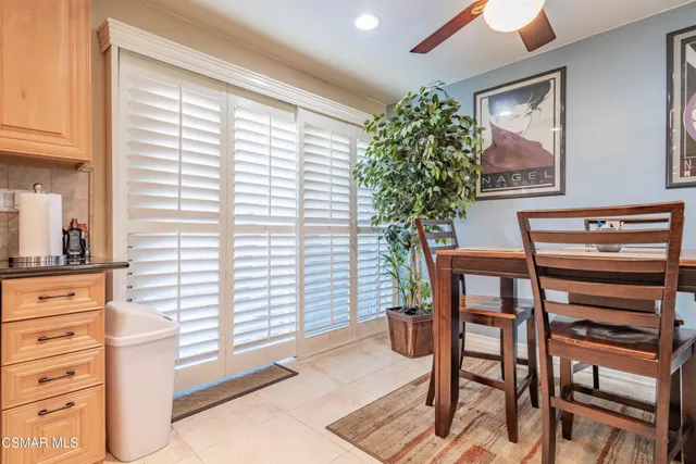 a room that has a chair and a table in it