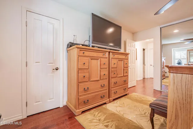 a room with furniture and a flat screen tv