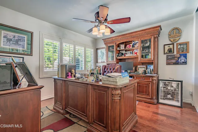 a kitchen with stainless steel appliances granite countertop a stove and a refrigerator