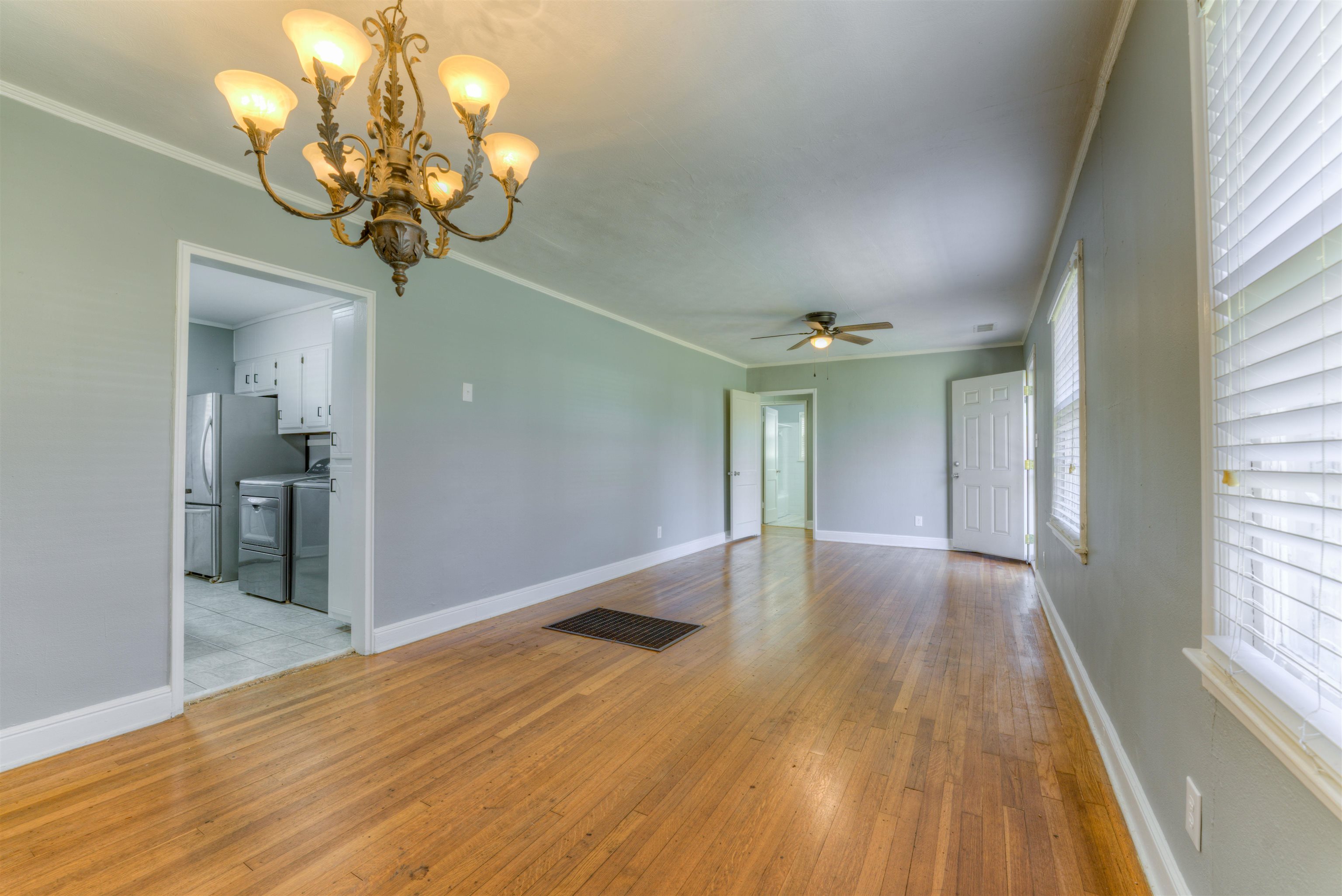 1180 Vaughn Road Memphis, TN 38122 - Photo 5 of 26 a view of a livingroom with a chandelier