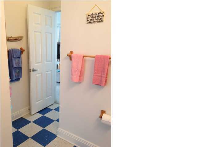 256 North Wall Street Inlet Beach, FL 32461 - Photo 32 of 32 a bathroom with a shower and a sink