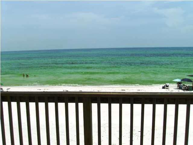 256 North Wall Street Inlet Beach, FL 32461 - Photo 7 of 32 a wooden floor in a yard with wooden fence