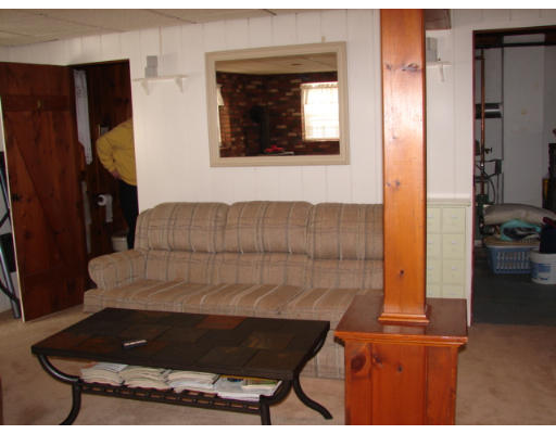 49 Ramshorn Road Dudley, MA 01571 - Photo 13 of 19 a living room with furniture and a rug