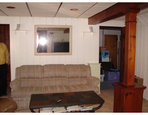 49 Ramshorn Road Dudley, MA 01571 - Photo 15 of 19 a living room with furniture and a fireplace