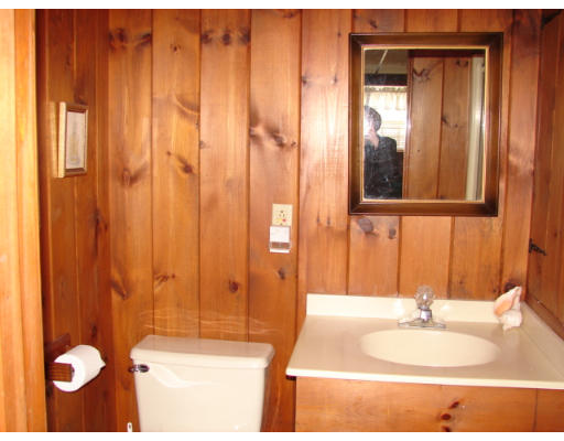49 Ramshorn Road Dudley, MA 01571 - Photo 16 of 19 a bathroom with a sink and a mirror