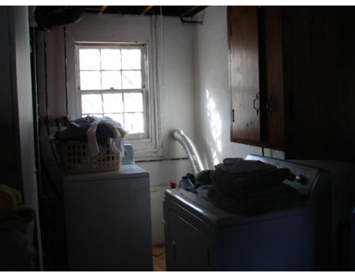 49 Ramshorn Road Dudley, MA 01571 - Photo 18 of 19 a kitchen with a sink and a window
