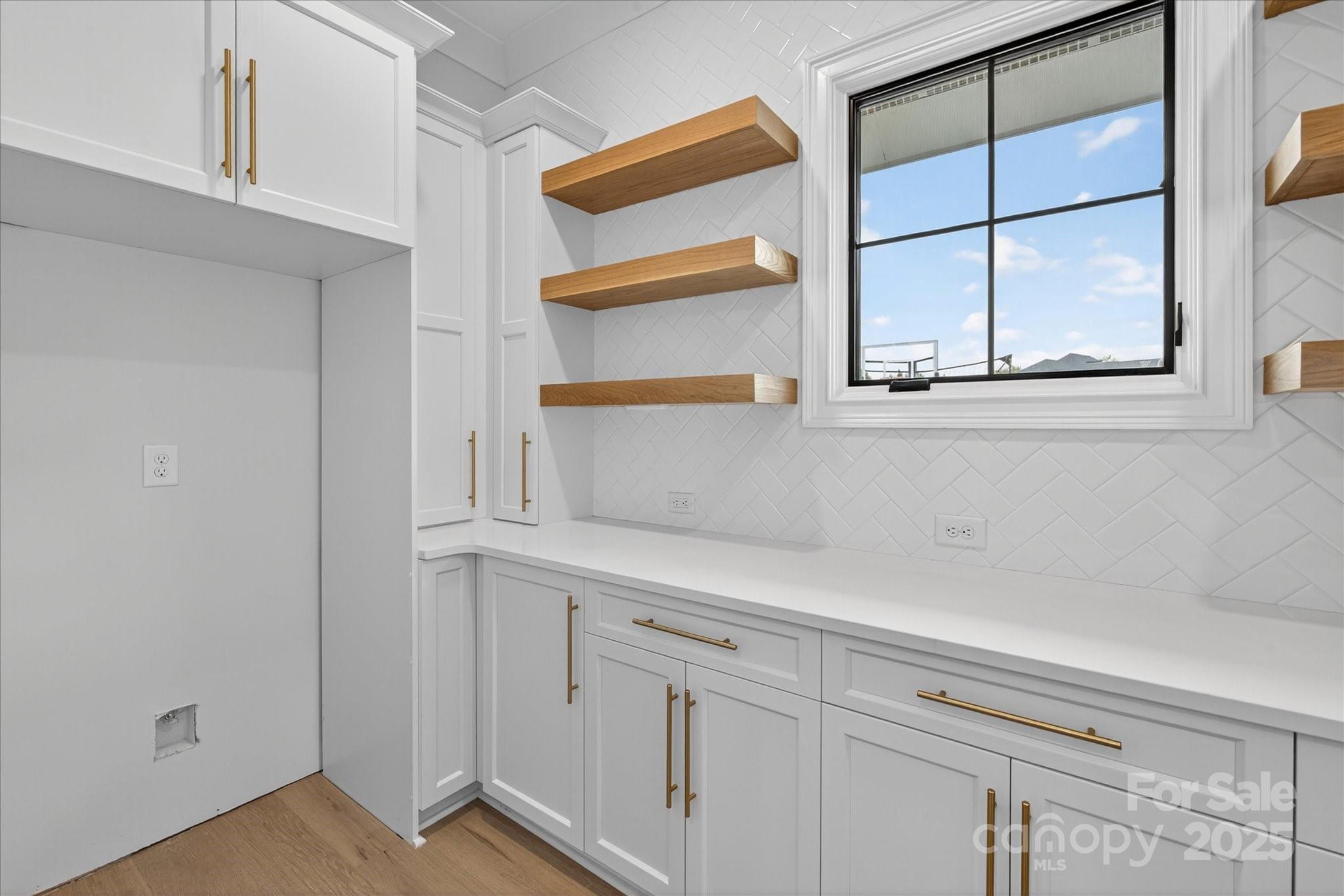 1405 Waxhaw-Marvin Road Waxhaw, NC 28173 - Photo 18 of 46 a view of a cabinets