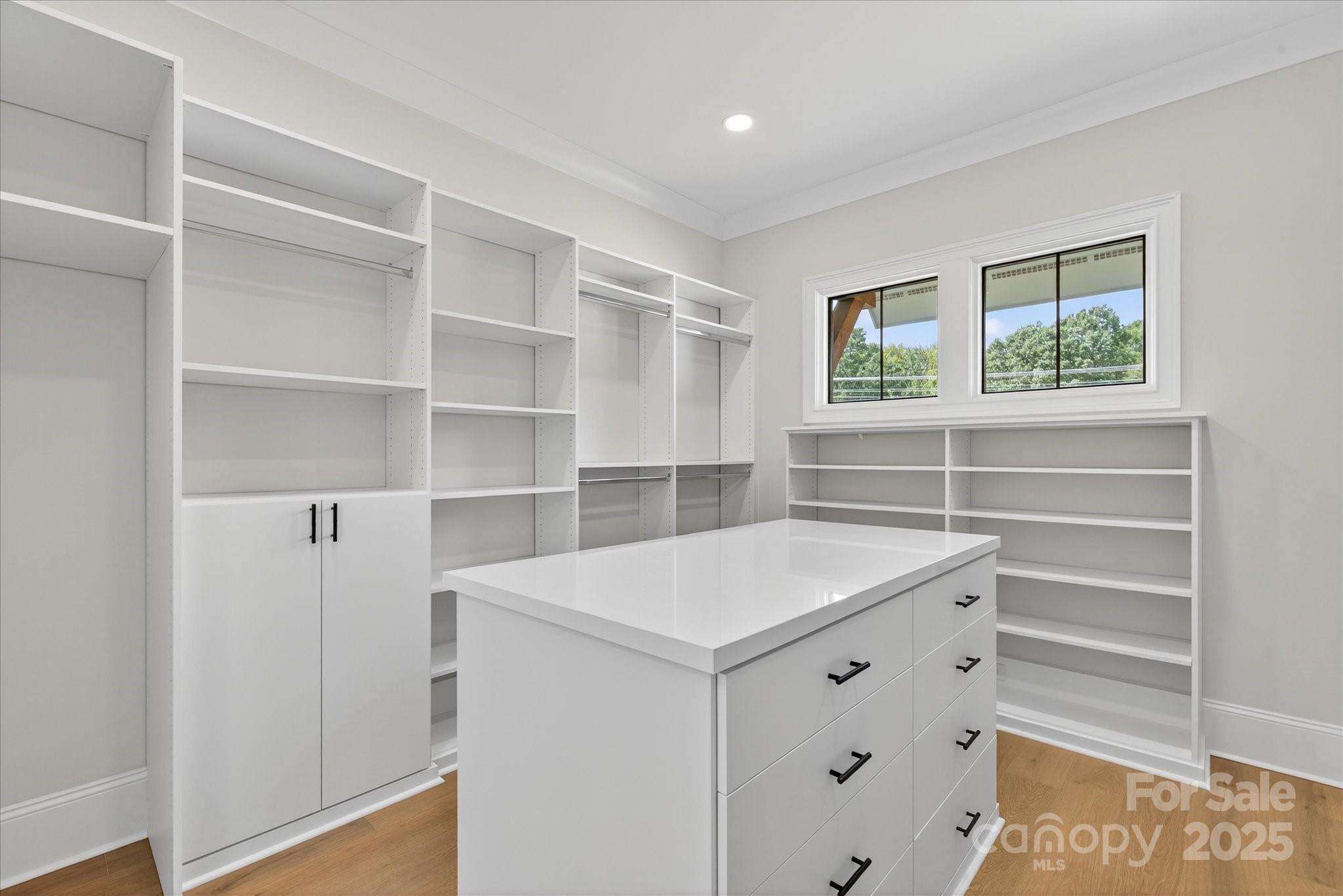 1405 Waxhaw-Marvin Road Waxhaw, NC 28173 - Photo 24 of 46 a view of storage and utility room with washer and dryer