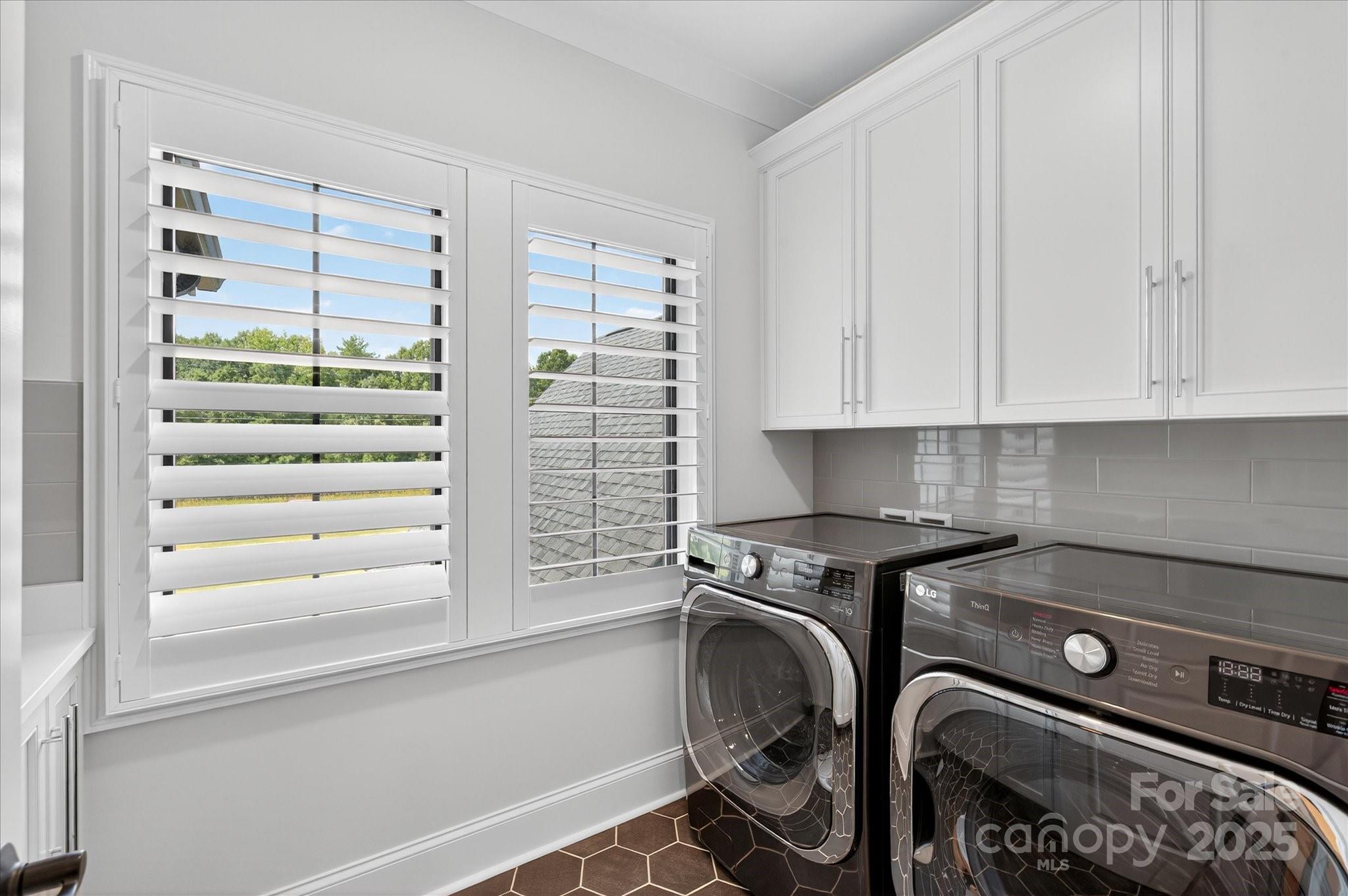 1405 Waxhaw-Marvin Road Waxhaw, NC 28173 - Photo 26 of 46 a kitchen with a stove and a window