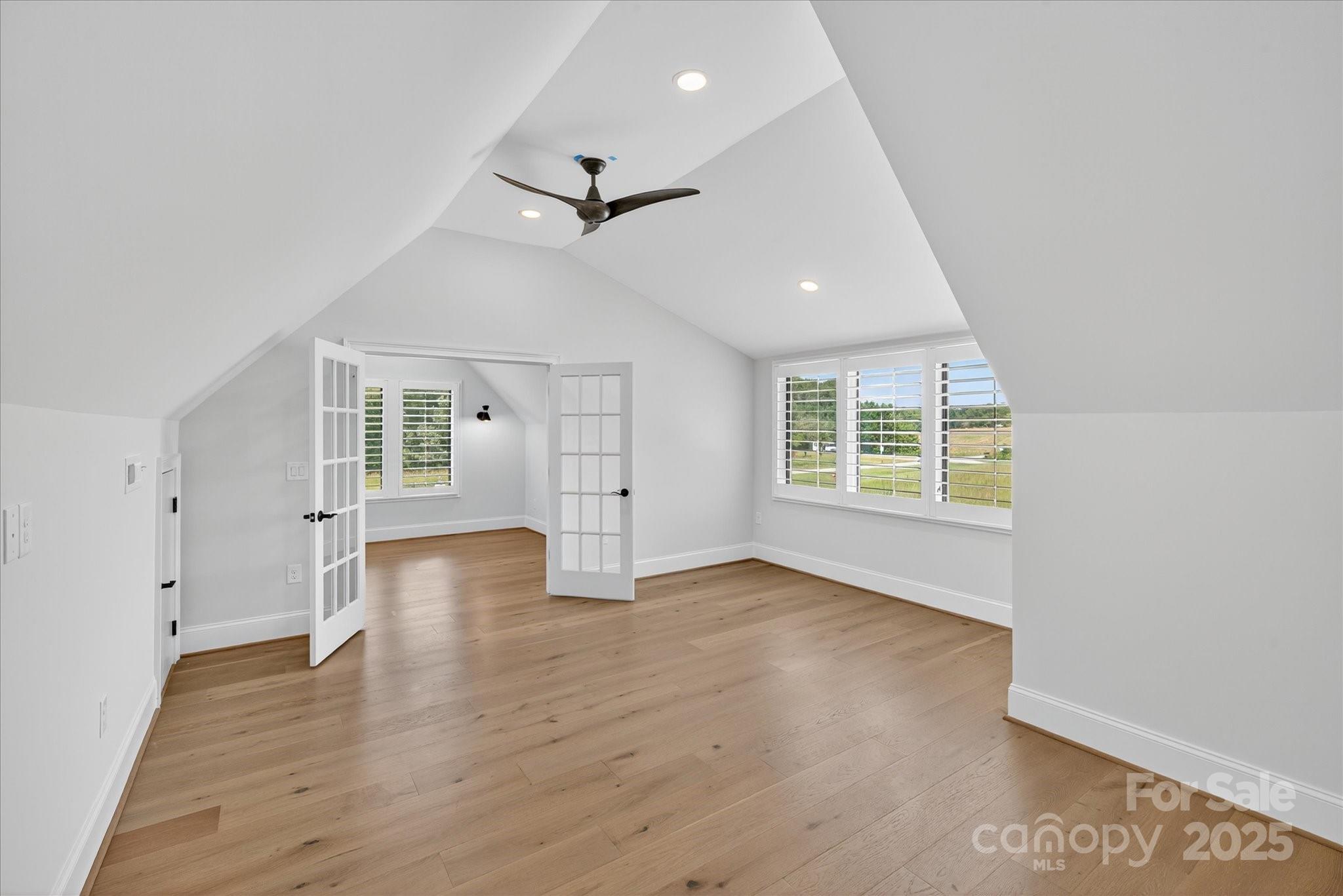 1405 Waxhaw-Marvin Road Waxhaw, NC 28173 - Photo 27 of 46 wooden floor in an empty room with a window
