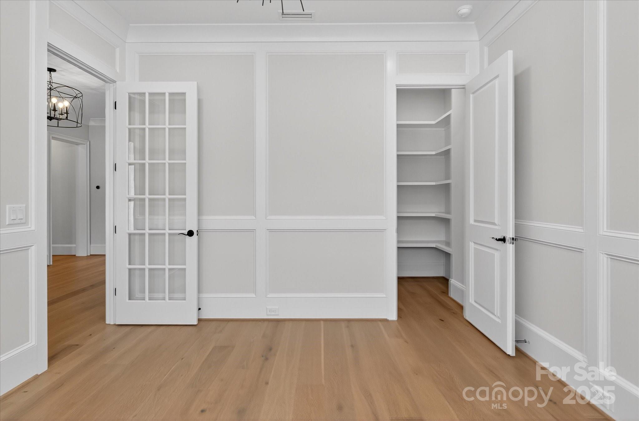 1405 Waxhaw-Marvin Road Waxhaw, NC 28173 - Photo 6 of 46 a view of an empty room with cabinet and entryway