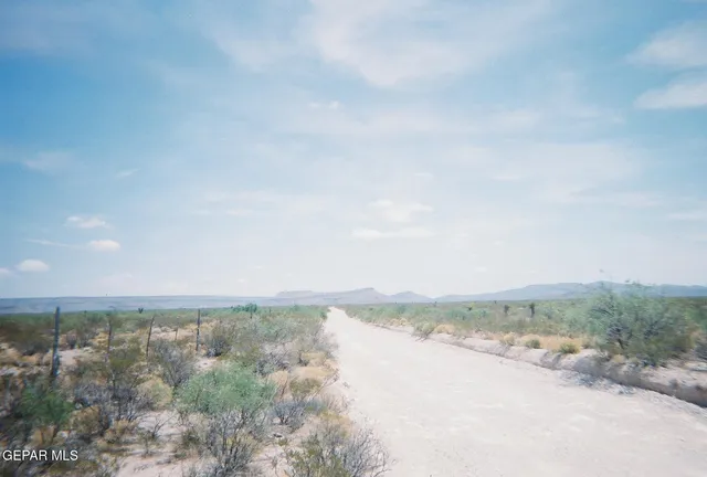 a view of a lake and mountain in back