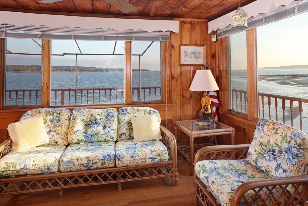 39 Beach Street Wareham, MA 02571 - Photo 14 of 24 a living room with furniture and a large window