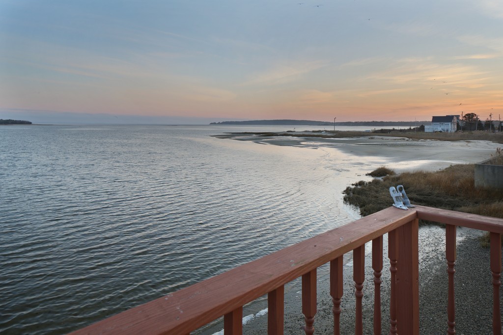 39 Beach Street Wareham, MA 02571 - Photo 22 of 24 a view of a lake from a balcony