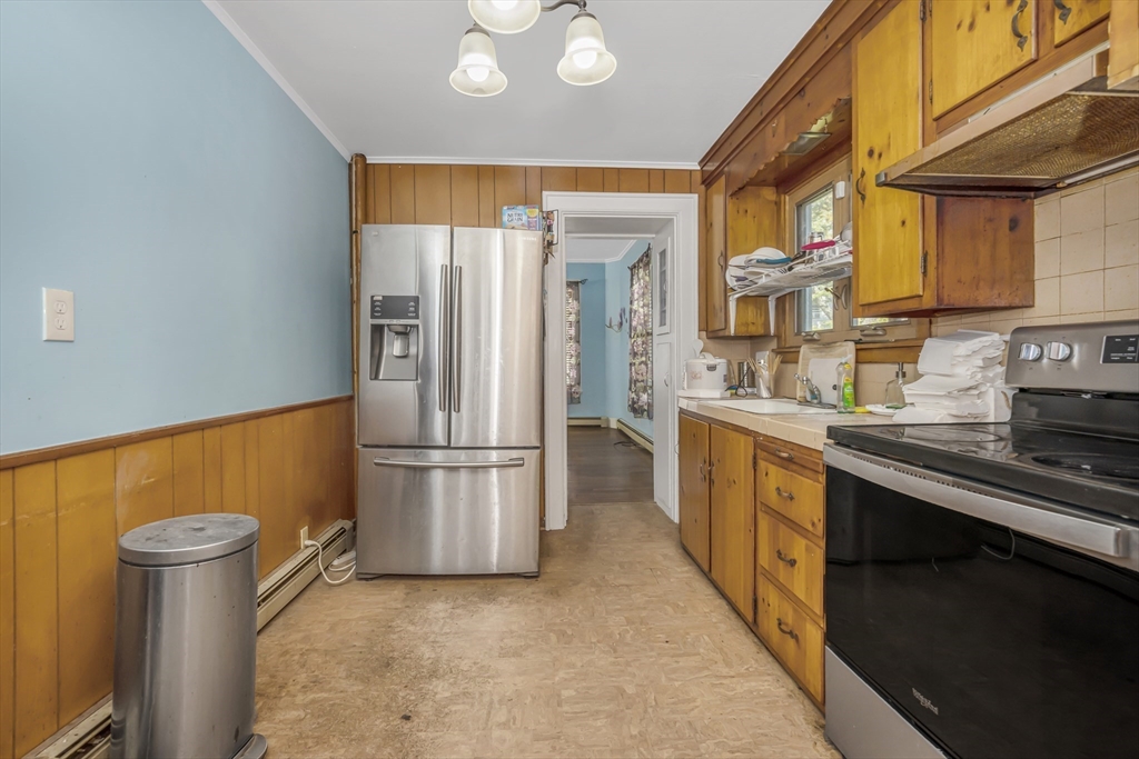 17 Dresser Street Southbridge, MA 01550 - Photo 1 of 3 a kitchen with stainless steel appliances granite countertop a refrigerator a stove and a sink