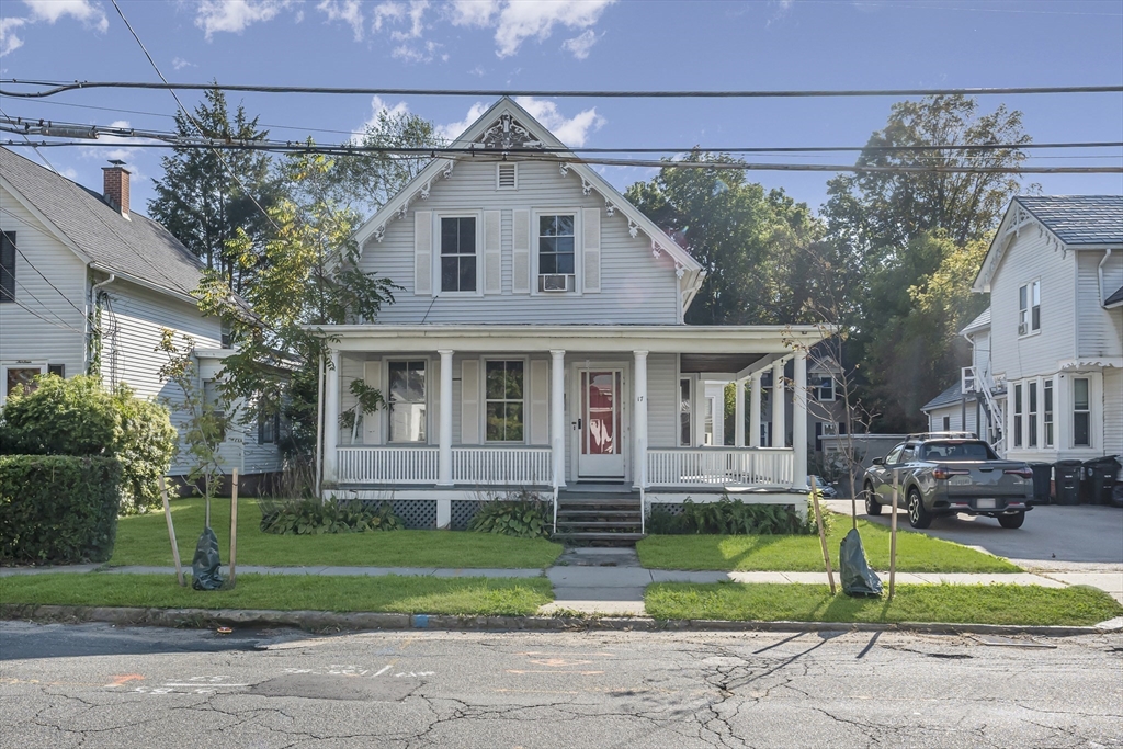 17 Dresser Street Southbridge, MA 01550 - Photo 3 of 3 a front view of a house with a yard