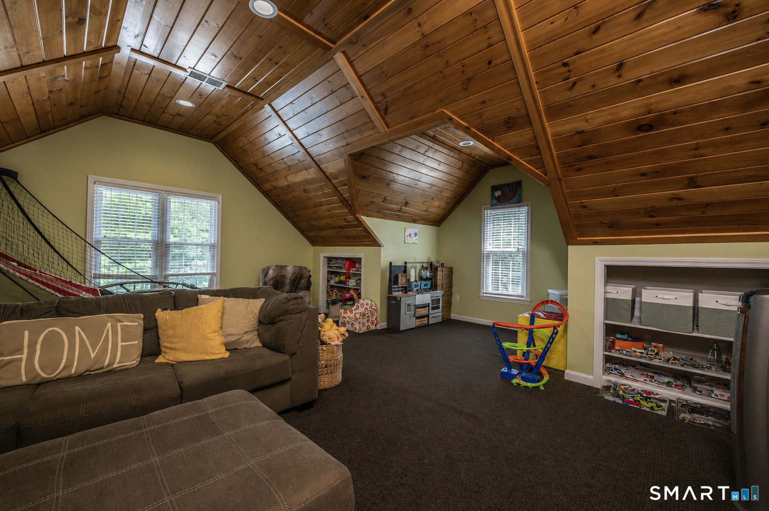 76 R Ivy Way Durham, CT 06422 - Photo 14 of 19 Versatile finished bonus room with stunning wood-plank ceilings, perfect as a 4th bedroom, playroom, media room, home office, or recreation space.
