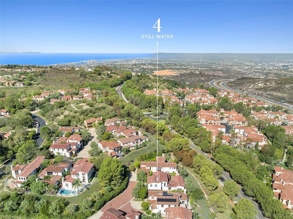 4 Still Water Newport Coast, CA 92657 - Photo 40 of 43 an aerial view of residential building and lake