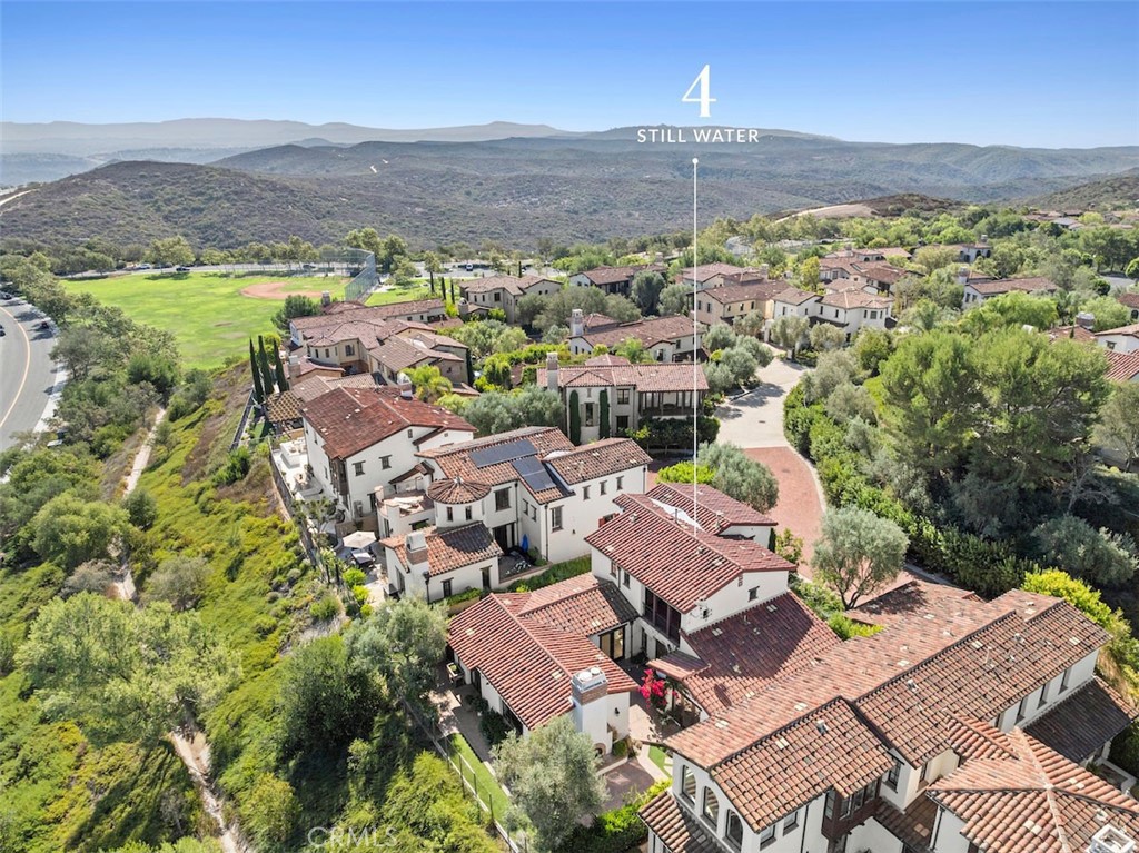 4 Still Water Newport Coast, CA 92657 - Photo 41 of 43 a view of a city with a lake