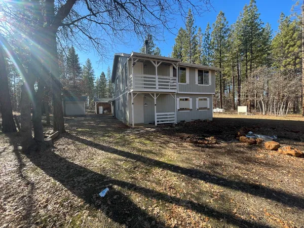 a view of backyard of house