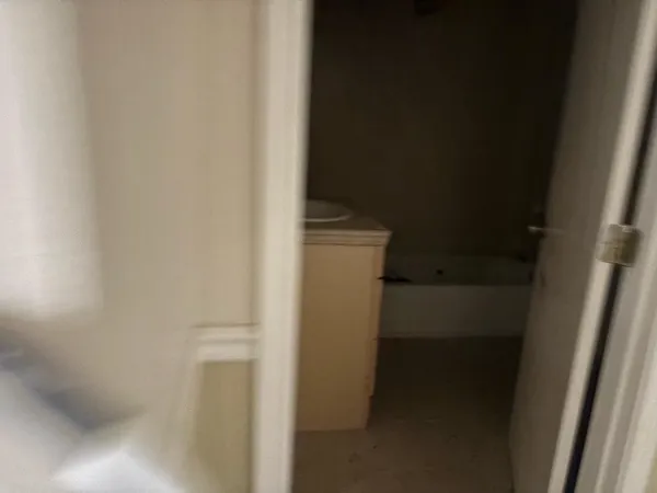 view of an empty room with a window
