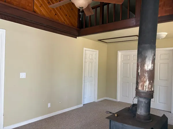 a view of a room with racks on the wall